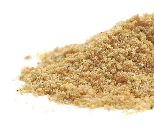 a pile of hing powder on a white background