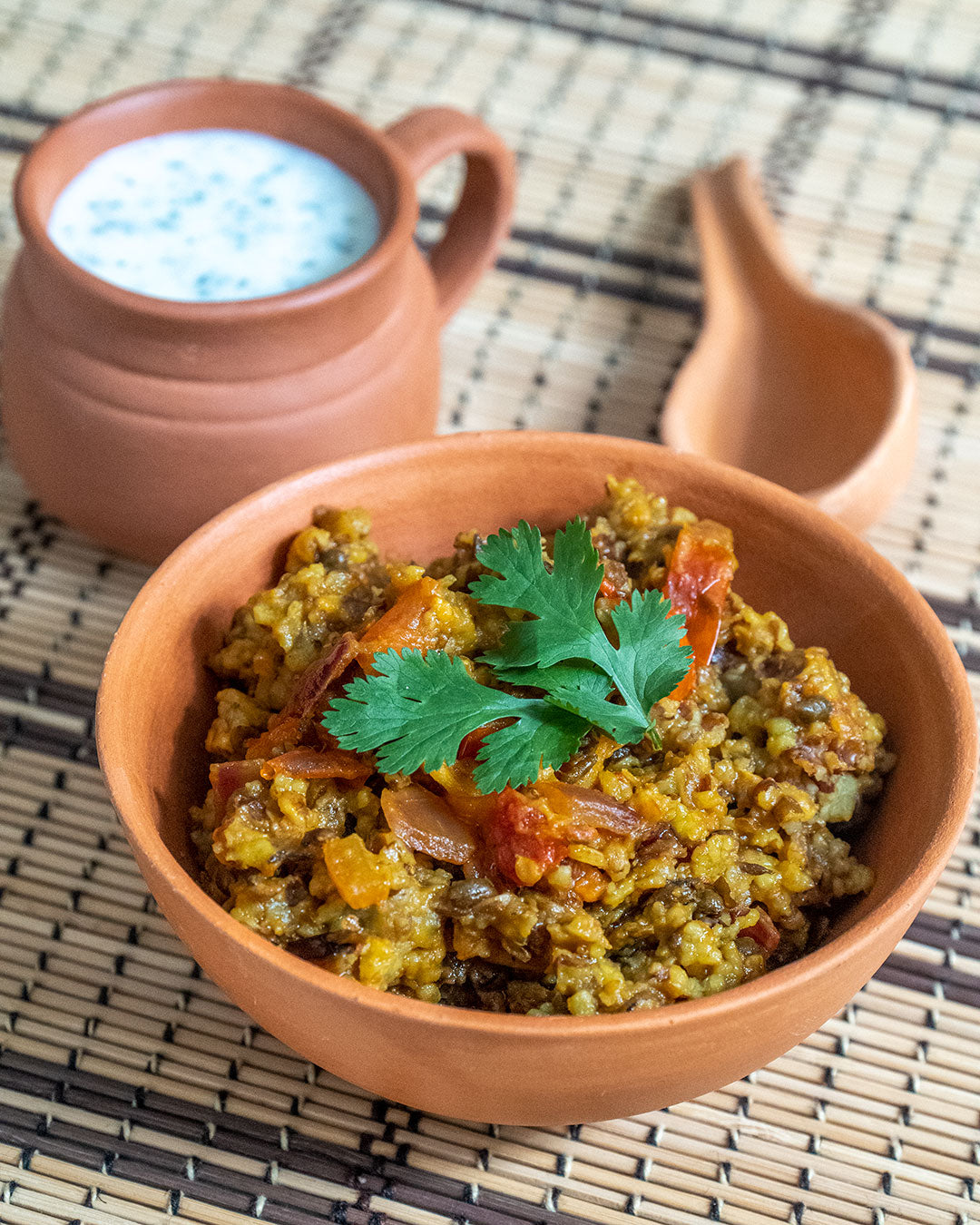 A bowl of kitchari on a table.
